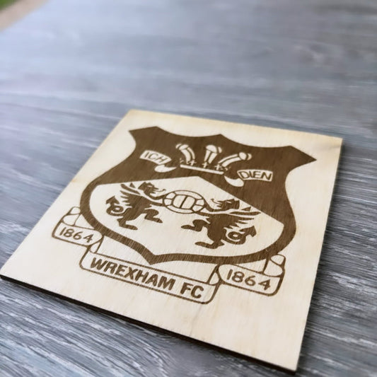 Handcrafted wooden coasters showcasing your favourite football teams using Laser engraving.